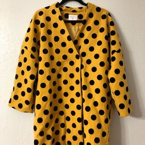 Yellow and black polka dot overcoat